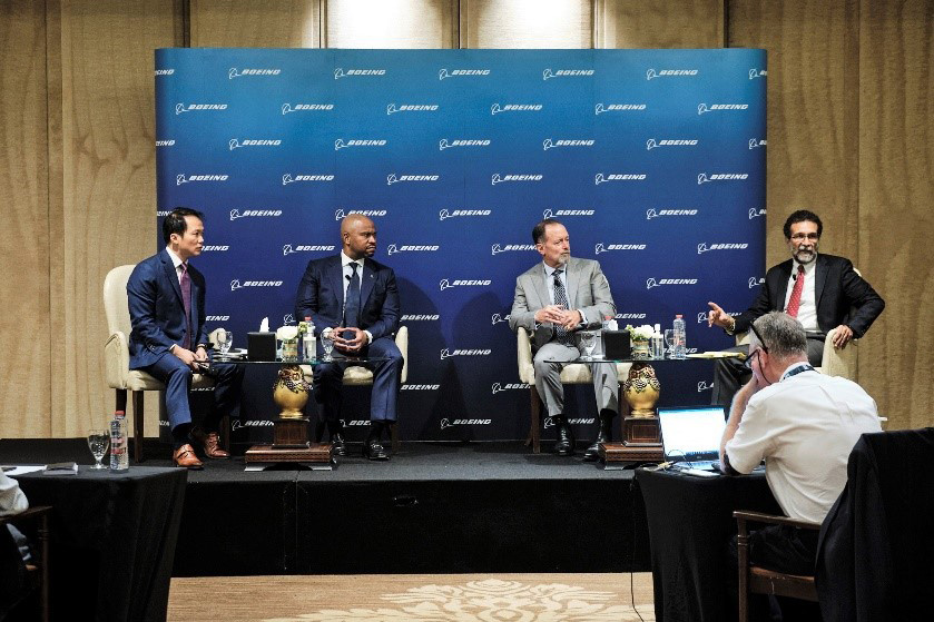 Shown here, from left: Bernard Choi, vice president of Global Media Relations; Ted Colbert, president and CEO of Boeing Global Services; Michael Manazir, vice president of Business Development for Defense, Space and Security; and Ihssane Mounir, senior vice president of Commercial Sales & Marketing.  Photo credit: Boeing