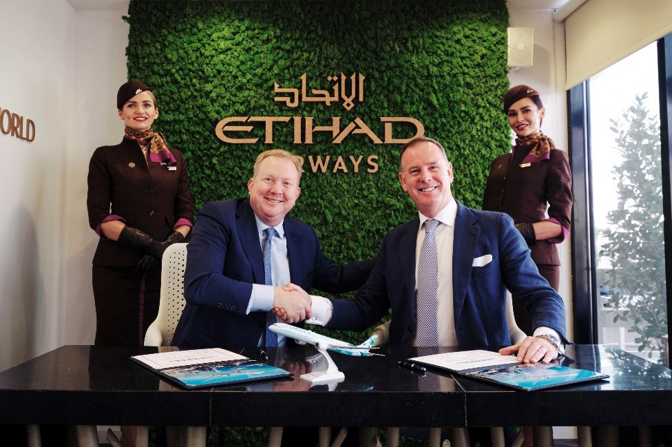 Stan Deal, Boeing Commercial Airplanes President and CEO, and Tony Douglas, group chief executive of Etihad Aviation Group, after signing an agreement expanding the companies’ partnership towards sustainable aviation for the Abu Dhabi-based airline and wider industry. (Boeing Photo)