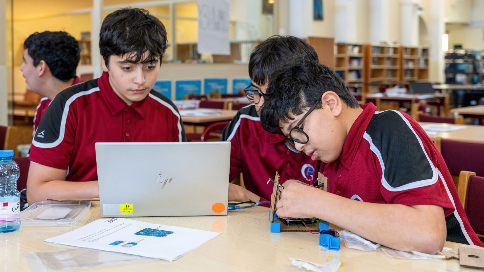 Students build their miniature satellite prototype at the CubeSat Explorer Challenge at Qatar Academy Doha on June 16, 2026.